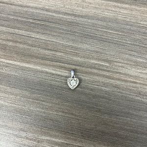 1/4 CT. T.W. Diamond Heart Frame Pendant in 10K White Gold